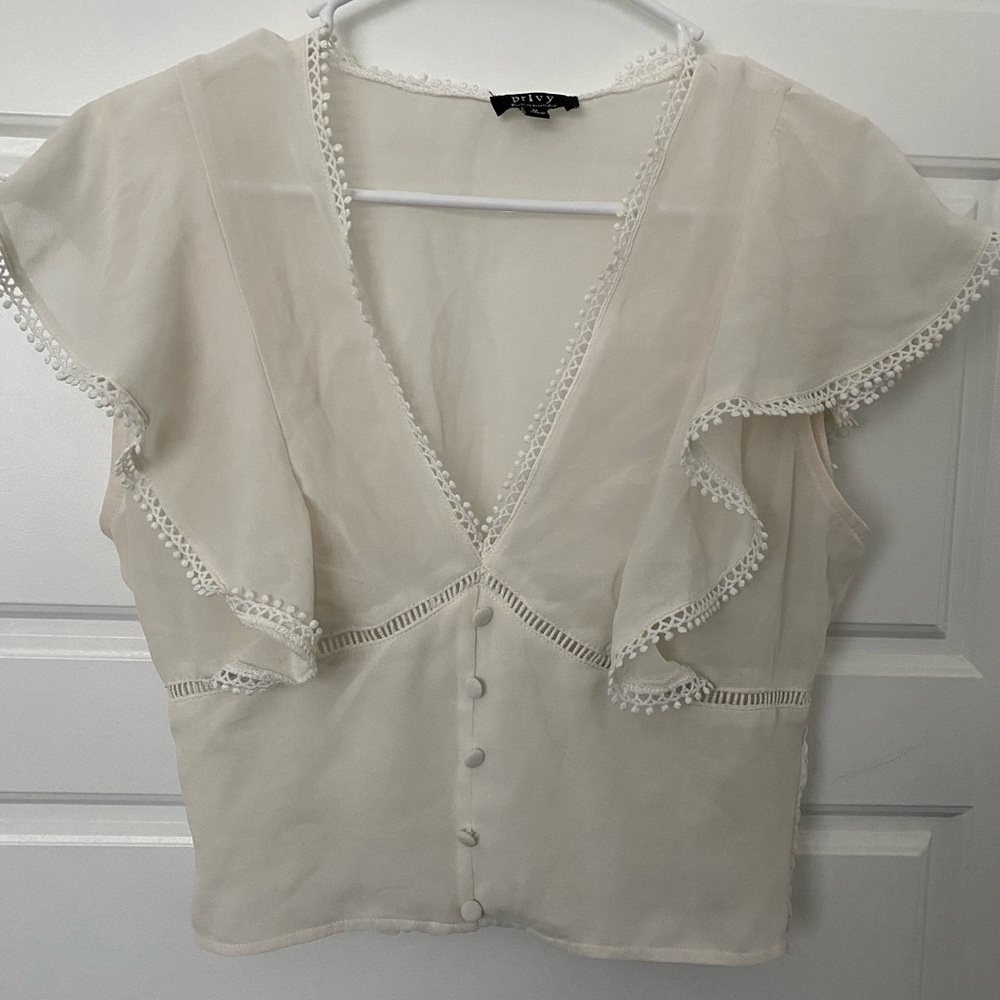 NWOT PRIVY cap sleeve semi-sheer blouse with trim detailing
